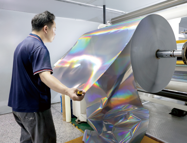 Quality inspection of laser self-adhesive label material during production